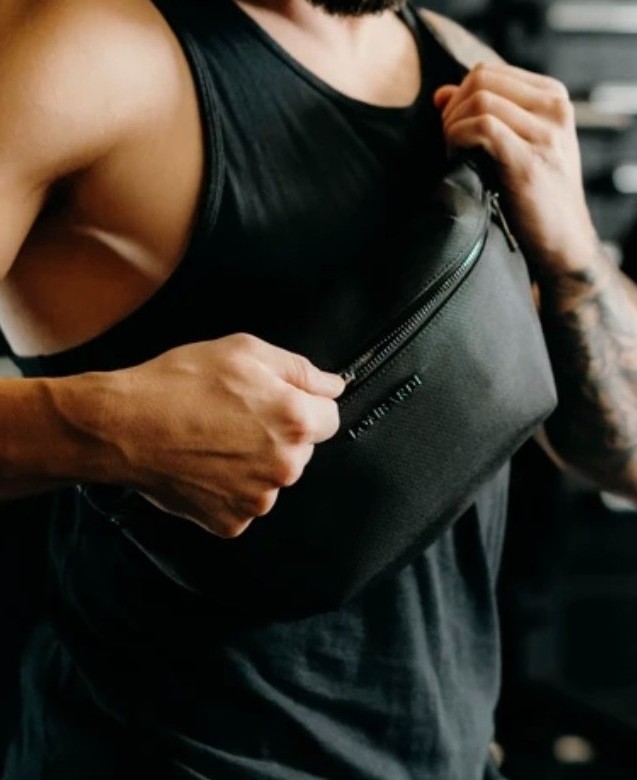Close view of the Command BumBag zip and embossed Lombardi mark